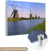 MuchoWow® Glasschilderij 30x20 cm - Schilderij acrylglas - Nederland - Molen - Water - Foto op glas - Schilderijen