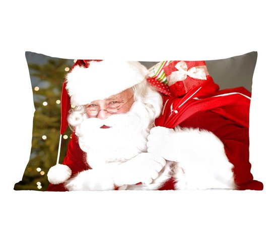 Sierkussens - Kussen - Een portret van de Kerstman die een rode zak over zijn schouder draagt - 50x30 cm - Kussen van katoen