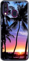 Geschikt voor Samsung Galaxy A40 hoesje - De kleurrijke zonsondergang achter een rij met palmbomen op Hawaï - Siliconen Telefoonhoesje