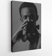 Canvas schilderij - Man holding a canon dlsr camera -   3029962 - 80*60 Vertical