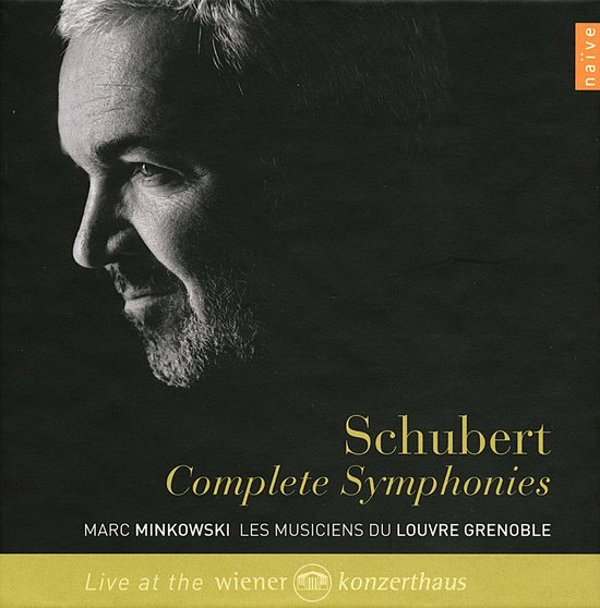 Albumhoes met portret van een man en tekst: Schubert Complete Symphonies, Marc Minkowski Les Musiciens Du Louvre Grenoble, Live at the Wiener Konzerthaus.