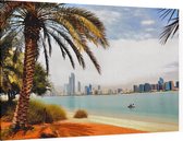 De skyline van Abu Dhabi achter een palmboom - Foto op Canvas - 90 x 60 cm