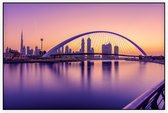 Zonsopkomst zorgt voor een paarse gloed in Dubai - Foto op Akoestisch paneel - 90 x 60 cm