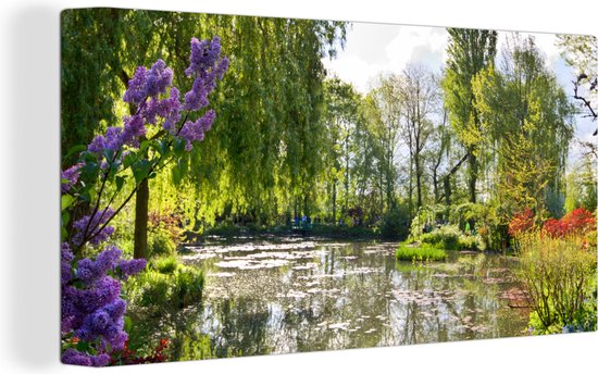 Canvas Schilderij Kleuren met weerkaatsing in het water van Monet's tuin in Frankrijk - 80x40 cm - Wanddecoratie