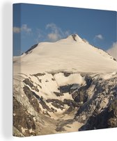 Canvas Schilderij Zon beschijnt een gletsjer in het Nationaal park Hohe Tauern in Oostenrijk - 90x90 cm - Wanddecoratie