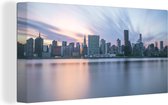 Canvas Schilderij Manhattan - Skyline - Water - 80x40 cm - Wanddecoratie