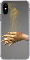 Geschikt voor iPhone X hoesje - Vrouw met goud geverfde handen en een wolk van glitters - Siliconen Telefoonhoesje