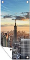 Tuinposter Indrukwekkende lucht boven het Empire State Building in Amerika - 40x80 cm - Wanddecoratie Buiten - Tuinposter - Tuindoek - Schuttingposter - Tuinschilderij