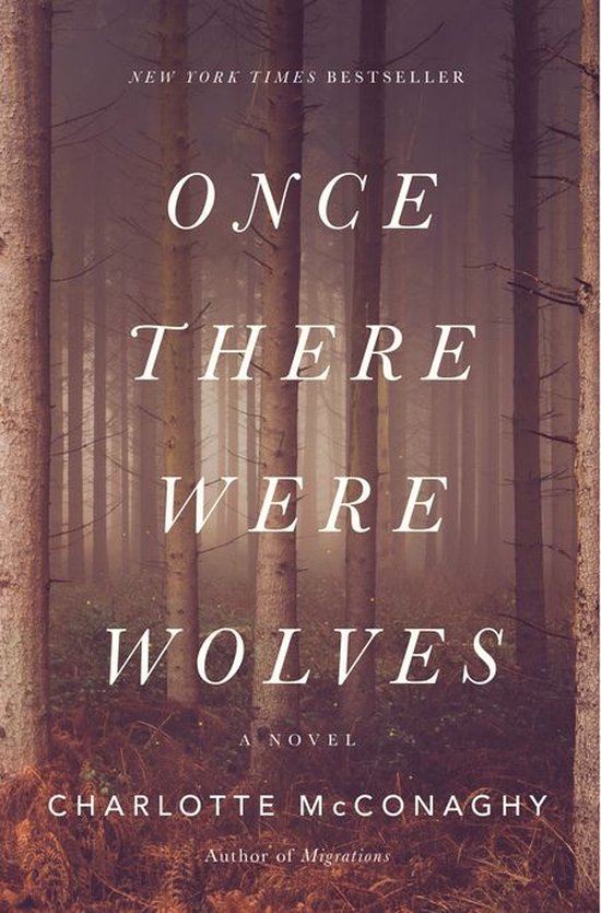 Boekomslag van "Once There Were Wolves" met tekst en een mistig bos met bomen.
