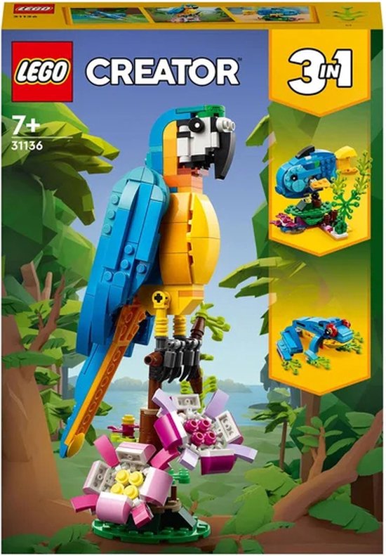 LEGO Creator 3in1 set verpakking met een grote blauwe en gele papegaai en kleinere afbeeldingen van een vis en kikker.