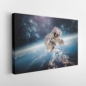 Astronaut in outer space against the backdrop of the planet earth. Elements of this image furnished by NASA- Modern Art Canvas - Horizontal - 241509286 - 80*60 Horizontal