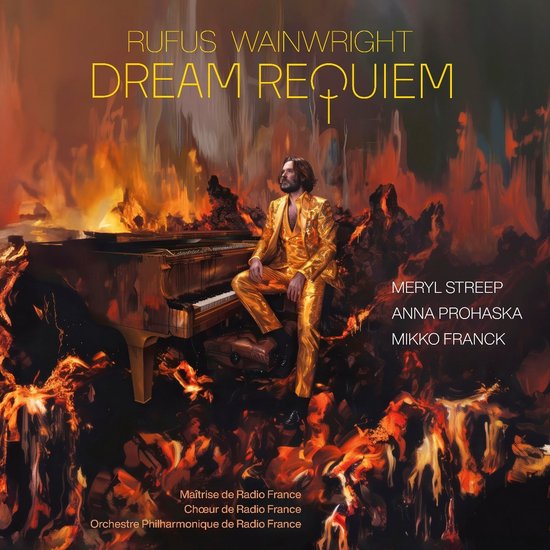 Rufus Wainwright zit op een piano, gekleed in een glanzend gouden pak, te midden van vlammen. "Dream Requiem" staat prominent vermeld.