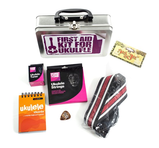 First Aid Kit for Ukulele in metalen trommel met snaren, tuner, akkoordenboekje, plectrum en gestreepte band.