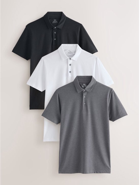 Drie korte poloshirts in zwart, wit en grijs, met kraag en knoopjes.