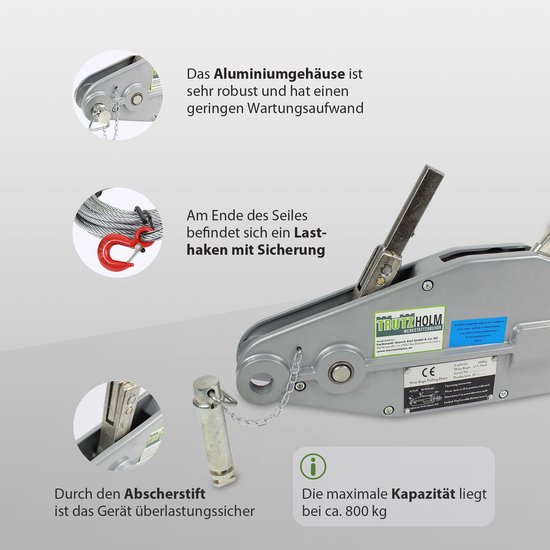 Zilverkleurige kabeltakel van aluminium, met kabel, rode hijshaak, pen en bedieningshendel. Maximale capaciteit 800 kg.