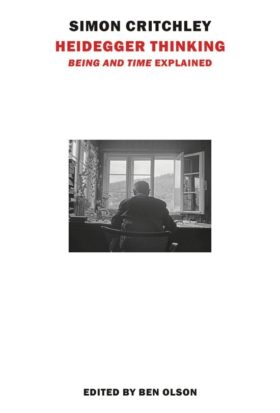 Boek 'Heidegger Thinking' met een zwart-witfoto van een man die aan een bureau bij een raam zit.