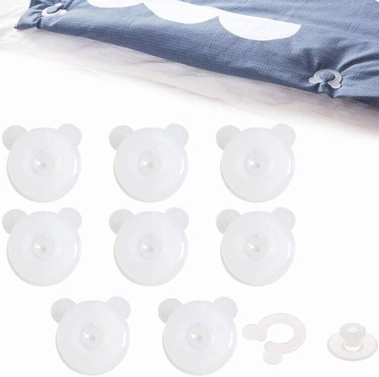 Set van 8 witte, beer-vormige dekbedclips met ronde sluitingen.
