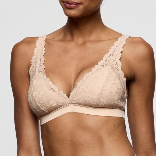 Nude kanten bralette met V-hals en brede band onder de borsten.