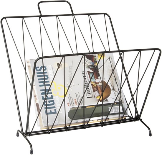 Zwarte metalen tijdschriftenhouder met geometrisch ruitpatroon en een 'Eigen Huis' tijdschrift erin.