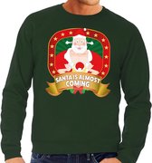 Foute kersttrui / sweater voor heren Santa Is Almost Coming - groen - Kerstman met dame M