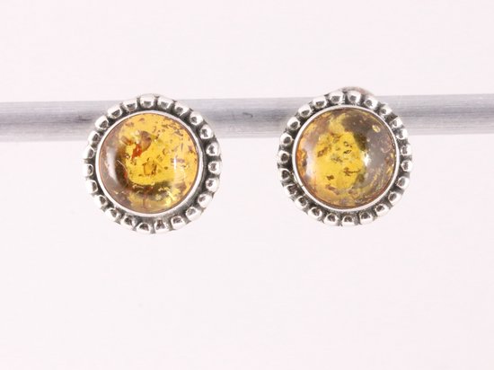 Fijne bewerkte ronde zilveren oorstekers met amber