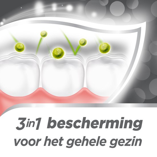 Drie witte tanden met een roze tandvleesrand en groene balletjes die wegkaatsen.