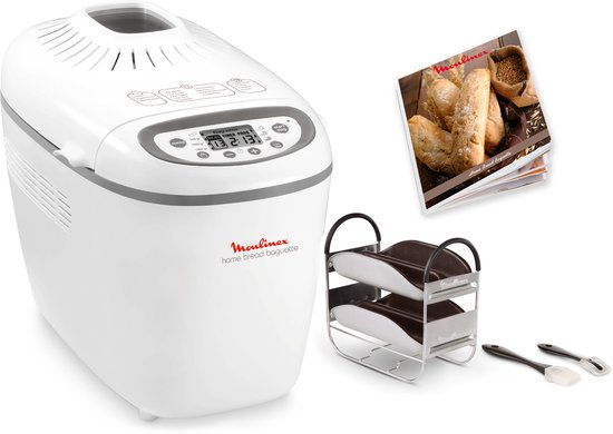 Witte broodbakmachine met bruine bakvormen, receptenboekje, en twee kwasten.