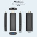 Technische tekening van de zwarte TV Stick met afmetingen: 97mm x 34.3mm x 15.8mm.