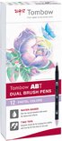 Verpakking van Tombow ABT Dual Brush pennen, met 12 pastelkleuren en een illustratie van een roos en vlinder.