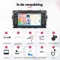 Onderdelen van een autoradio-set: kabels, GPS-antenne, microfoon, achteruitrijcamera en handleiding.