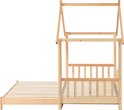 Zijaanzicht van een huisbedframe van natuurlijk massief hout, met uitschuifbare bodem.