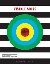 Boekomslag met de titel 'VISIBLE SIGNS'. Zwarte en witte strepen met daarop een bullseye-achtig patroon in rood, geel, blauw en groen.