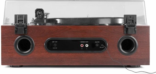 Achterkant van een retro platenspeler met houten kast, met aansluitingen voor DC 12V, Audio Out, Aux In en FM Ant.