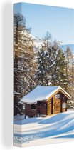 Canvas Schilderij Hut in de bergen van Zwitserland tijdens de winter - 40x80 cm - Wanddecoratie