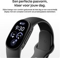Zwarte Fitbit Edge met AMOLED-scherm toont tijd, hartslag en stappen.