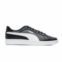 Zwarte Puma Smash sneakers met witte Puma-streep en witte zool.