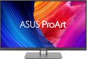 ASUS ProArt monitor in landschapsmodus met zilveren standaard en kleurrijk scherm.