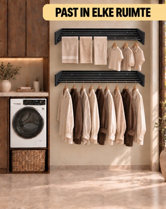 Een wasruimte met een wasmachine, op de muur gemonteerde droogrekken met handdoeken en kleding.