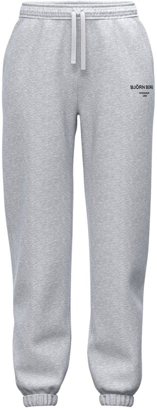 Lichtgrijze joggingbroek met trekkoord, elastische zoom en Björn Borg logo op linkerbeen. Vooraanzicht.