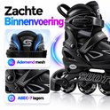 Zwarte inlineskates met zachte binnenvoering, ademende mesh en ABEC-7 lagers.