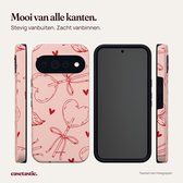Meerdere aanzichten van een roze hoesje met hartlolly-print en een zwarte beschermende binnenlaag.