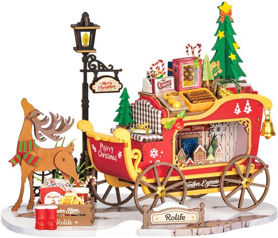 Gedetailleerde miniatuurset van een rode kerstslee met een rendier, kerstboom en geschenken.