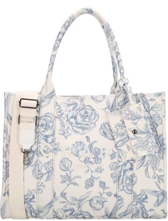 Witte tas met blauwe bloemenprint en vogels, met "CHARM LONDON" logo en schouderband.