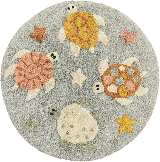 Tapis rond avec des appliqués de tortues roses, jaunes, vertes et beiges, et des étoiles de mer sur fond gris-bleu.