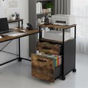 Industrieel archiefkastje met houten ladenfronten en zwarte zijkanten, naast een bureau met printer.