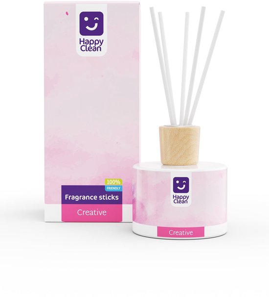 Roze geurverspreider met houten dop en witte stokjes, naast de kartonnen verpakking met 'Happy Clean Fragrance sticks Creative'.