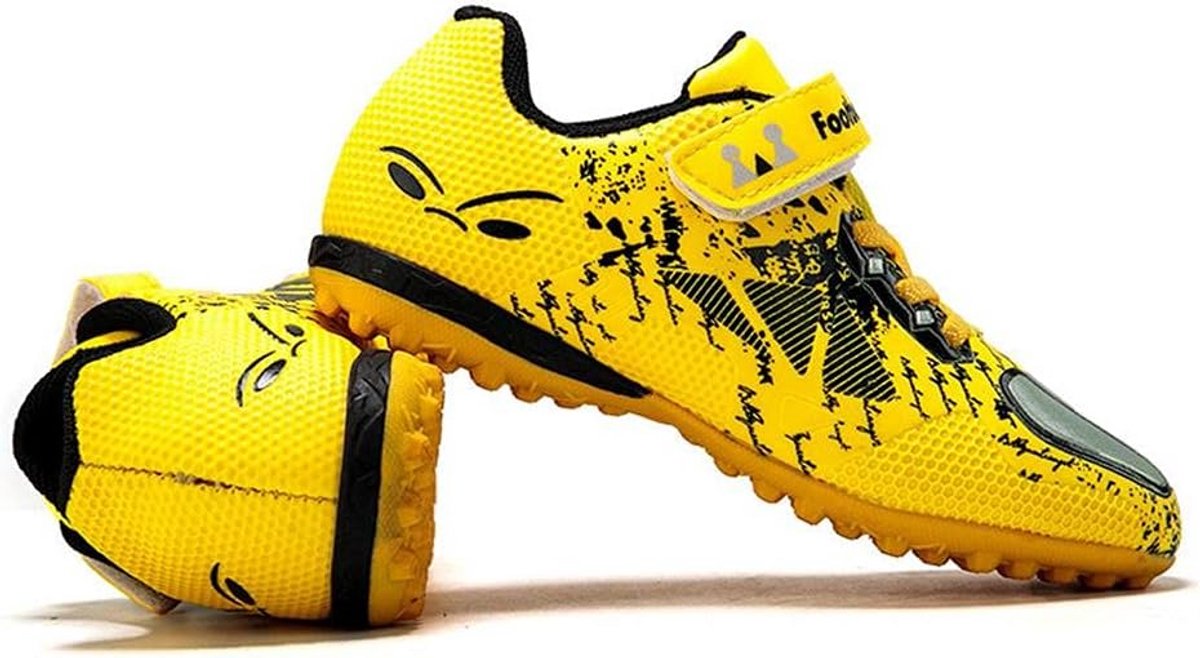 Lichte, gele kindervoetbalschoenen met antislipzool, geschikt voor kunstgras, maat 28-39, unisex ontwerp.