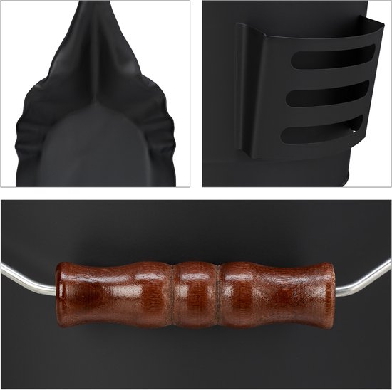 Detail van zwarte kolenemmer met houten handvat en schep.
