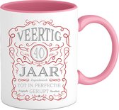 40 Jaar Legendarische Gebrouwen Mok met tekst | Rood - Zilver | Grappig Verjaardag Beker Cadeau | Bedrukte Mokken | Roze | 330 ML