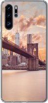 Geschikt voor Huawei P30 Pro hoesje - Brooklyn Brug en de skyline van New York tijdens zonsondergang - Siliconen Telefoonhoesje